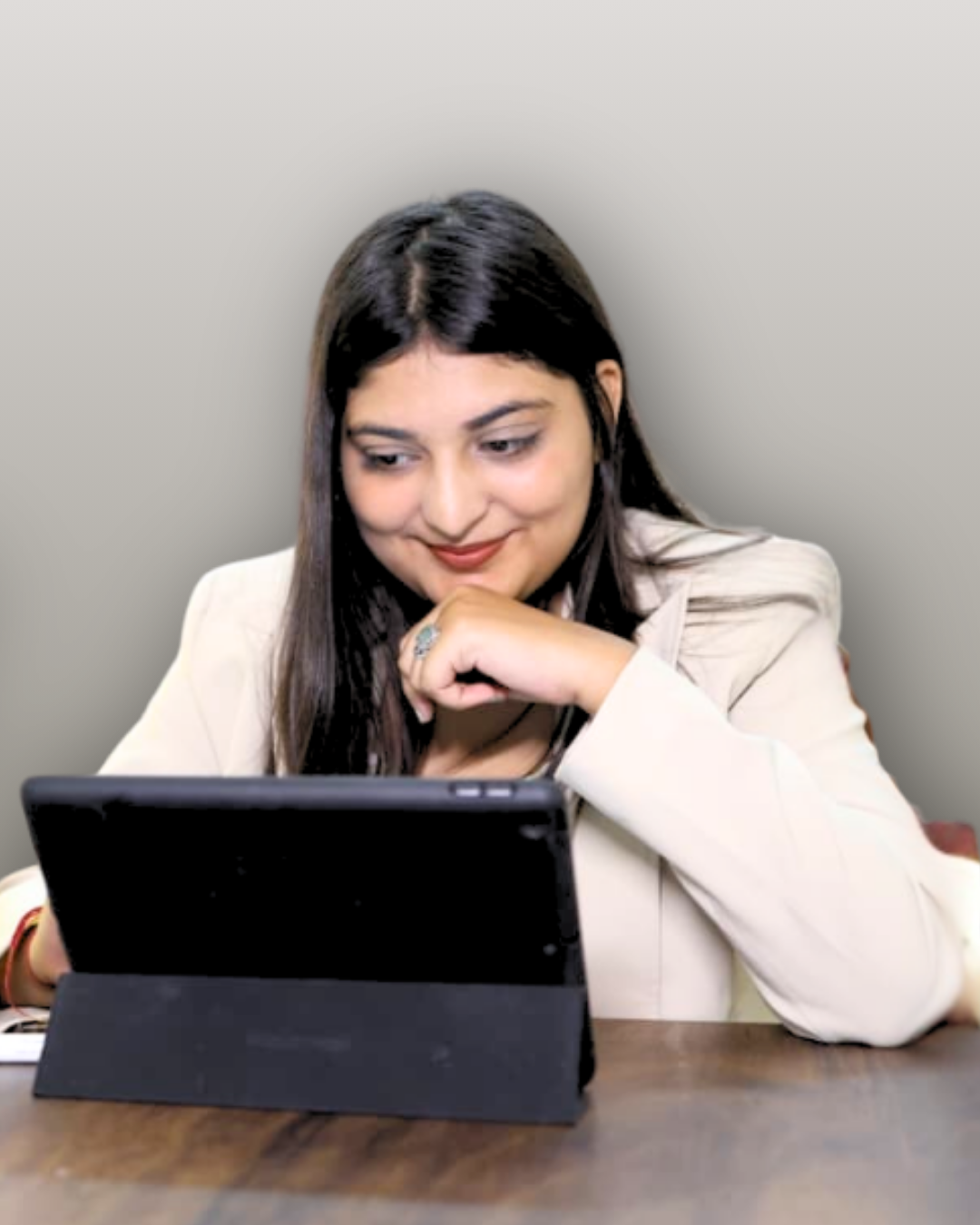 Ritika Sidana - English Trainer working on laptop
